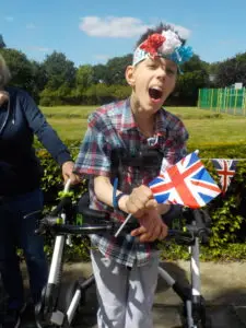 Young person with flag celebrating jubilee